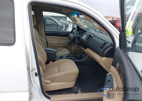 2014 Toyota Tacoma Base V6 z USA, uszkodzony, nr VIN 5TFMU4FN9EX025557